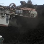 
              Giorgos Papadopoulos, supervisor at Public Power Company (PPC), stands near a coal excavator at Greece's largest mine outside the northern city of Kozani on Thursday, June 2, 2022. Energy market turmoil caused by the war in Ukraine has triggered an increase in coal-fired electricity production in the European Union and a temporary slowdown in the closure of power plants long-earmarked for retirement. (AP Photo/Thanassis Stavrakis)
            