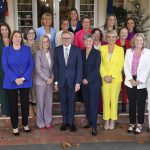 
              Australian Prime Minister Anthony Albanese, front center, poses with a group of women including 13 female government ministers after their swearing-in ceremony at Government House in Canberra, Australia, Wednesday, June 1, 2022. Australia’s new government sworn in Wednesday includes a record 13 women, including the first female Muslim to serve in the role and the second Indigenous person named Indigenous Affairs minister. (Mick Tsikas/AAP Image via AP)
            
