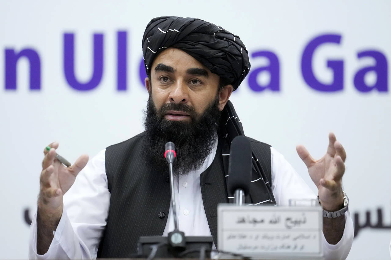 Zabiullah Mujahid, the spokesman for the Taliban government, speaks during a press conference in Ka...