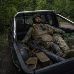
              A Ukrainian serviceman pauses before going back to the frontline in the Donetsk oblast region, eastern Ukraine, Sunday, June 5, 2022. (AP Photo/Bernat Armangue)
            