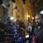 
              Arthur Deouveaux survivor of the Bataclan attack and president of life for Paris association speaks to the media after the verdict in Paris Wednesday, June 29, 2022. The lone survivor of a team of Islamic State extremists was convicted Wednesday of murder and other charges and sentenced to life in prison without parole in the 2015 bombings and shootings across Paris that killed 130 people in the deadliest peacetime attacks in French history. (AP Photo/Michel Euler)
            