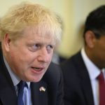 
              Britain's Prime Minister Boris Johnson addresses his Cabinet during his weekly Cabinet meeting in Downing Street on Tuesday, June 7, 2022 in London. Johnson was meeting his Cabinet and trying to patch up his tattered authority on Tuesday after surviving a no-confidence vote that has left him a severely weakened leader. (Leon Neal/Pool Photo via AP)
            