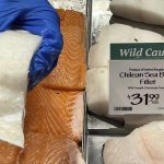 
              Fillets of Chilean sea bass caught near the U.K.-controlled South Georgia island are displayed for sale at a Whole Foods Market in Cleveland, Ohio on June 17, 2022. A diplomatic row is taking place near the South Pole dividing the normally allied U.S. and U.K. governments in response to provocations from Russia over catch limits of the meaty toothfish. The feud could lead to an import ban on the fish, which U.S. officials insist is being caught unlawfully in violation of rules governed by the Antarctic Treaty. (AP Photo/Joshua Goodman)
            