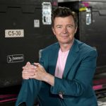 
              British singer-songwriter Rick Astley poses for a portrait before a concert at the Allstate Arena in Rosemont, Ill., on June 17, 2022. Astley has joined New Kids on the Block, Salt-N-Pepa, and En Vogue for the 57-date "Mixtape 2022" U.S. arena tour this summer. (AP Photo/Charles Rex Arbogast)
            