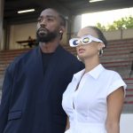 
              Tyrod Taylor, left, and Draya Michele watch the Marcelo Burlon County of Milan men's Spring Summer 2023 collection presented in Milan, Italy, Saturday, June 18, 2022. (AP Photo/Nicola Marfisi)
            