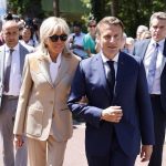 
              France's President Emmanuel Macron and his wife Brigitte Macron leaves after voting in the first round of French parliamentary election in Le Touquet, northern France, Sunday June 12, 2022. French voters are choosing lawmakers in a parliamentary election as President Emmanuel Macron seeks to secure his majority while under growing threat from a leftist coalition. More than 6,000 candidates, ranging in age from 18 to 92, are running for 577 seats in the National Assembly in the first round of the election. (Ludovic Marin, Pool via AP)
            