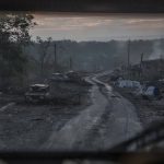 
              The gutted remains of cars lie along a road during heavy fighting at the front line in Severodonetsk, Luhansk region, Ukraine, Wednesday, June 8, 2022. (AP Photo/Oleksandr Ratushniak)
            