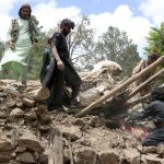 
              Afghan villagers collects belongings from under the rubble of a home that was destroyed in an earthquake in the Spera District of the southwestern part of Khost Province, Afghanistan, Wednesday, June 22, 2022. A powerful earthquake struck a rugged, mountainous region of eastern Afghanistan early Wednesday, killing at least 1,000 people and injuring 1,500 more in one of the country's deadliest quakes in decades, the state-run news agency reported. (AP Photo)
            