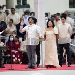 
              President-elect Ferdinand "Bongbong" Marcos Jr., right, is sworn in by Supreme Court Chief Justice Alexander Gesmundo during the inauguration ceremony at National Museum on Thursday, June 30, 2022 in Manila, Philippines. Marcos was sworn in as the country's 17th president. (AP Photo/Aaron Favila)
            