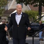 
              President Joe Biden reacts when asked how he was feeling as he leaves St. Edmund Roman Catholic Church in Rehoboth Beach, Del., after attending a Mass, Saturday, June 18, 2022. Bystanders cheered as he was asked how he was feeling. He smiled, and took three hops forward, making a jump-rope motion with his hands. (AP Photo/Manuel Balce Ceneta)
            