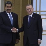 
              Turkish President Recep Tayyip Erdogan, right, and Venezuela's President Nicolas Maduro shake hands during a welcome ceremony, in Ankara, Turkey, Wednesday, June 8, 2022.(AP Photo/Burhan Ozbilici)
            