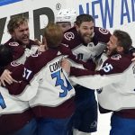 
              The Colorado Avalanche celebrate after the team defeated the Tampa Bay Lightning in Game 6 of the NHL hockey Stanley Cup Finals on Sunday, June 26, 2022, in Tampa, Fla. The Avalanche won 2-1. (AP Photo/John Bazemore)
            