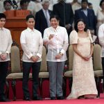 
              President-elect Ferdinand "Bongbong" Marcos Jr. and his family attend the inauguration ceremony at National Museum on Thursday, June 30, 2022 in Manila, Philippines. Marcos was sworn in as the country's 17th president. (AP Photo/Aaron Favila)
            