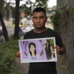 
              In this photo taken in San Salvador, El Salvador, on Wednesday, May 18, 2022, Jesús holds a photo of a drawing of his mother, Manuela, who was arrested in 2008 on suspicion of breaching El Salvador’s abortion law after she suffered an obstetric emergency. His mother died from cancer in 2010 while serving a 30-year sentence for aggravated homicide. The Inter-American Court of Human Rights recently ruled that the Salvadoran government had violated Manuela's rights and ordered it to pay damages to her two sons who were left orphaned. (AP Photo/Jessie Wardarski)
            