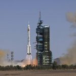 
              In this photo released by Xinhua News Agency, the Long March-2F carrier rocket carrying China's Shenzhou 14 spacecraft blasts off from the launch pad at the Jiuquan Satellite Launch Center in Jiuquan, northwest China's Gansu Province, Sunday, June 5, 2022. China on Sunday launched the new three-person mission to complete work on its permanent orbiting space station. (Li Gang/Xinhua via AP)
            