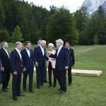 
              Britain's Prime Minister Boris Johnson, second right, speaks with from left,  European Council President Charles Michel, Italy's Prime Minister Mario Draghi, Germany's Chancellor Olaf Scholz, France's President Emmanuel Macron, US President Joe Biden, European Commission President Ursula von der Leyen and Canada's Prime Minister Justin Trudeau and Japan's Prime Minister Fumio Kishida as they leave after posing  for a group photo , during the G7 Summit, at Castle Elmau in Kruen, near Garmisch-Partenkirchen, Germany, Sunday, June 26, 2022. The Group of Seven leading economic powers are meeting in Germany for their annual gathering Sunday through Tuesday. (Brendan Smialowski/Pool via AP)
            