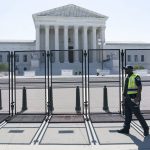
              Security works outside of the Supreme Court, Thursday, June 30, 2022, in Washington. (AP Photo/Jacquelyn Martin)
            