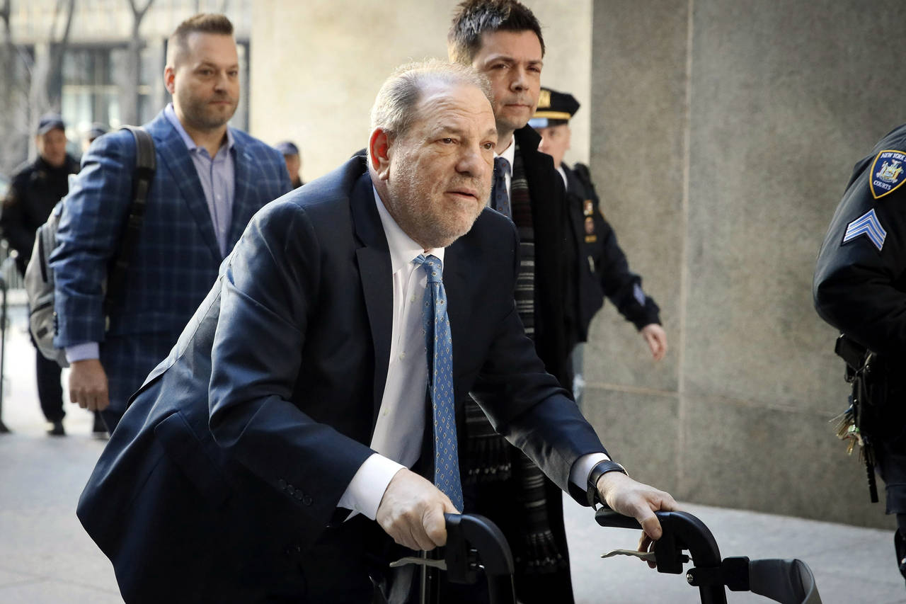 FILE - Harvey Weinstein arrives at a Manhattan courthouse as jury deliberations continue in his rap...