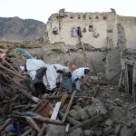 
              Afghans sift through destruction after an earthquake in Gayan village, in Paktika province, Afghanistan, Thursday, June 23, 2022. A powerful earthquake struck a rugged, mountainous region of eastern Afghanistan early Wednesday, flattening stone and mud-brick homes in the country's deadliest quake in two decades, the state-run news agency reported. (AP Photo/Ebrahim Nooroozi)
            