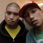 FILE - Members of the band N.E.R.D., Chad Hugo, left, and Pharrell Williams pose in their dressing room at the New England Dodge Music Center in Hartford, Conn. on May 16, 2008. Hugo and Williams, who make up the iconic producing team The Neptunes, will be inducted into the Songwriters Hall of Fame. (AP Photo/George Ruhe, File)