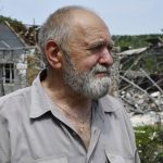 
              A man reacts as he stands next to a building damaged by an overnight missile strike in Sloviansk, Ukraine, Wednesday, June 1, 2022. (AP Photo/Andriy Andriyenko)
            