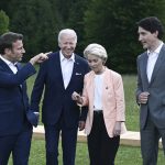 
              From left, President Emmanuel Macron, US President Joe Biden, European Commission President Ursula von der Leyen and Canada's Prime Minister Justin Trudeau leave after posing for a group photo , during the G7 Summit, at Castle Elmau in Kruen, near Garmisch-Partenkirchen, Germany, Sunday, June 26, 2022. The Group of Seven leading economic powers are meeting in Germany for their annual gathering Sunday through Tuesday. (Brendan Smialowski/Pool via AP)
            