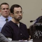 
              FILE -Larry Nassar sits during his sentencing hearing Wednesday, Jan. 24, 2018, in Lansing, Mich. On Friday, June 17, 2022 the Michigan Supreme Court has rejected a final appeal from sports doctor Larry Nassar, who was sentenced to decades in prison for sexually assaulting gymnasts, including Olympic medalists.  (AP Photo/Carlos Osorio, File)
            