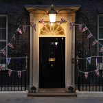 
              A general view at dusk of 10 Downing Street in London, Monday, June 6, 2022. British Prime Minister Boris Johnson survived a no-confidence vote on Monday, securing enough support from his Conservative Party to remain in office despite a rebellion that leaves him a weakened leader with an uncertain future. (AP Photo/David Cliff)
            