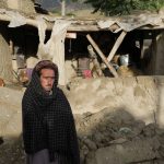 
              A man stands among destruction after an earthquake in Gayan village, in Paktika province, Afghanistan, Thursday, June 23, 2022. A powerful earthquake struck a rugged, mountainous region of eastern Afghanistan early Wednesday, flattening stone and mud-brick homes in the country's deadliest quake in two decades, the state-run news agency reported. (AP Photo/Ebrahim Nooroozi)
            