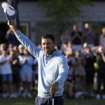 
              Charles Schwartzel of South Africa celebrates on the 18th green after winning the inaugural LIV Golf Invitational at the Centurion Club in St Albans, England, Saturday, June 11, 2022. (AP Photo/Alastair Grant)
            