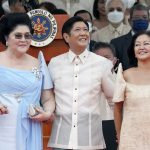 
              President Ferdinand Marcos Jr. stands with his mother Imelda Marcos, left, and his wife Maria Louise Marcos, right, during the inauguration ceremony at National Museum on Thursday, June 30, 2022 in Manila, Philippines. Marcos was sworn in as the country's 17th president. (AP Photo/Aaron Favila)
            