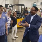 
              FILE - Republican candidate for Illinois governor Richard Irvin speaks with employees during a tour of HM Manufacturing Inc. in Wauconda, Ill., June 21, 2022. Irvin is seeking the Republican nomination to face Democratic Gov. J.B. Pritzker in November. (AP Photo/Sara Burnett, File)
            