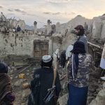 
              In this photo released by a state-run news agency Bakhtar, Afghans look at destruction caused by an earthquake in the province of Paktika, eastern Afghanistan, Wednesday, June 22, 2022. (Bakhtar News Agency via AP)
            