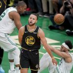 
              Golden State Warriors guard Stephen Curry (30) reacts during the second quarter of Game 3 of basketball's NBA Finals against the Boston Celtics, Wednesday, June 8, 2022, in Boston. (AP Photo/Steven Senne)
            