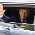 
              France's President Emmanuel Macron waves as he leaves the polling station after voting in the first round of French parliamentary election in Le Touquet, northern France, Sunday June 12, 2022. French voters are choosing lawmakers in a parliamentary election as President Emmanuel Macron seeks to secure his majority while under growing threat from a leftist coalition. More than 6,000 candidates, ranging in age from 18 to 92, are running for 577 seats in the National Assembly in the first round of the election. (Ludovic Marin, Pool via AP)
            