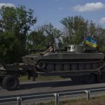 
              A tank is towed near Slovyansk, eastern Ukraine, Saturday, June 4, 2022. (AP Photo/Bernat Armangue)
            