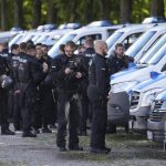 
              Police prepare their equipment and gather prior to a demonstration ahead of the G7 summit in Munich, Germany, Saturday, June 25, 2022. The G7 Summit will take place at Castle Elmau near Garmisch-Partenkirchen from June 26 through June 28, 2022. (AP Photo/Matthias Schrader)
            