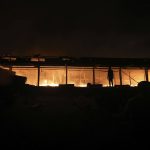 
              A fire rages at the BM Inland Container Depot, a Dutch-Bangladesh joint venture, in Chittagong, 216 kilometers (134 miles) southeast of capital, Dhaka, Bangladesh, early Sunday, June 5, 2022. Several people were killed and more than 100 others were injured in the fire the cause of which could not be immediately determined. (AP Photo)
            
