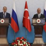 
              Russian Foreign Minister Sergey Lavrov, left, talks to journalists next to Turkish Foreign Minister Mevlut Cavusoglu during a joint news conference in Ankara, Wednesday, June 8, 2022. (AP Photo/Burhan Ozbilici)
            