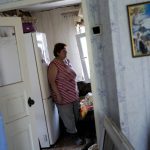 
              Svitlana Romashkina stands in her damaged home after a strike in Druzhkivka, Ukraine, Sunday, June 5, 2022. (AP Photo/Bernat Armangue)
            