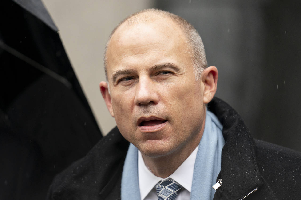 FILE - Michael Avenatti speaks to members of the media after leaving federal court on Feb. 4, 2022,...