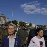 
              European Commission President Ursula von der Leyen, left, visits Maidan Square in Kyiv, Ukraine, Saturday, June 11, 2022. (AP Photo/Natacha Pisarenko)
            
