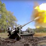 
              In this handout photo released by Russian Defense Ministry Press Service released on Sunday, June 5, 2022. A Pion artillery system of the Russian military fires at a target in an undisclosed location in Ukraine. (Russian Defense Ministry Press Service via AP)
            