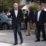 
              President Joe Biden reacts when asked how he was feeling as he leaves St. Edmund Roman Catholic Church in Rehoboth Beach, Del., after attending a Mass, Saturday, June 18, 2022. Bystanders cheered as he was asked how he was feeling. He smiled, and took three hops forward, making a jump-rope motion with his hands. (AP Photo/Manuel Balce Ceneta)
            