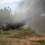 
              Ukrainian soldiers fire at Russian positions from a U.S.-supplied M777 howitzer in Ukraine's eastern Donetsk region Saturday, June 18, 2022.  (AP Photo/Efrem Lukatsky)
            