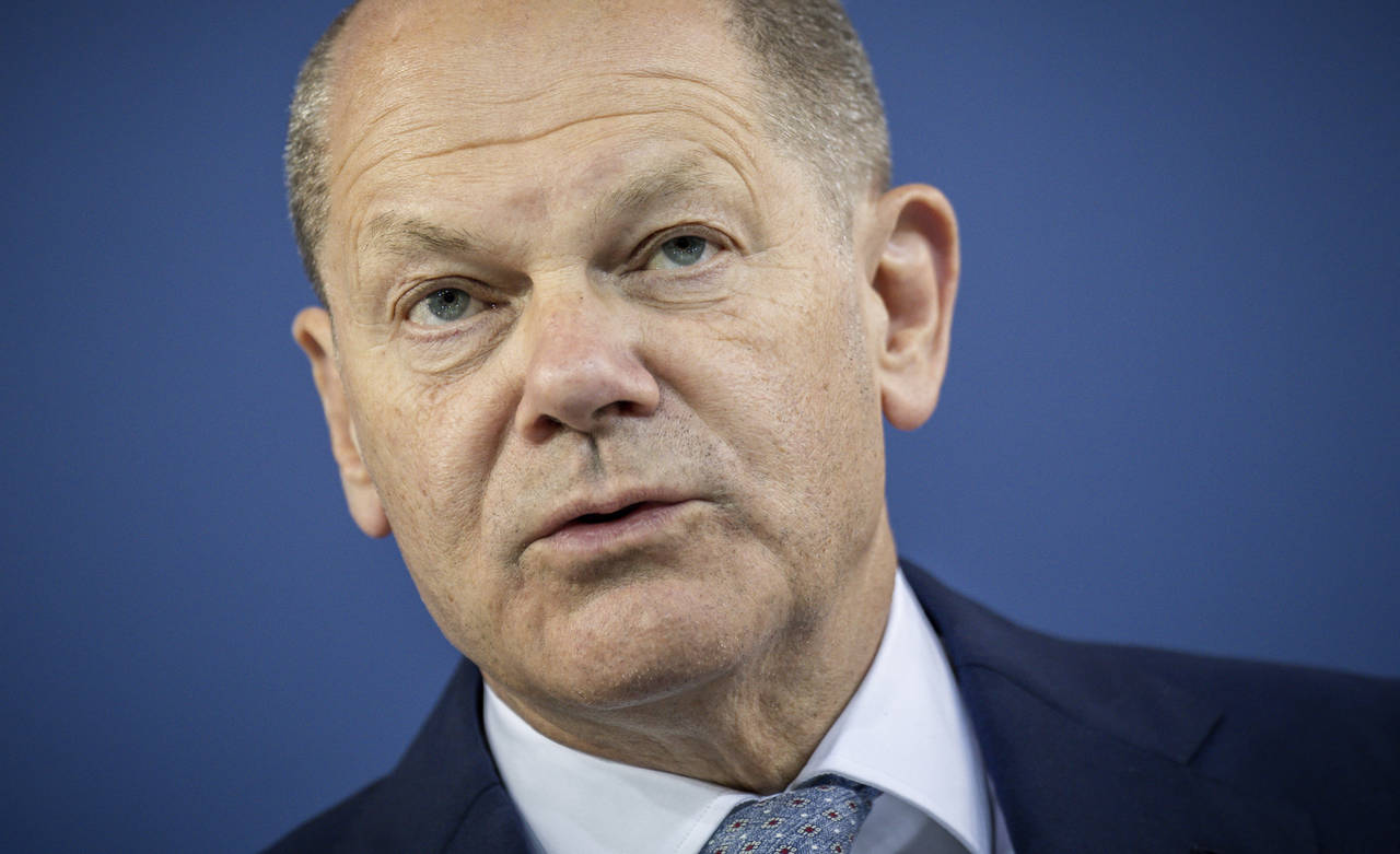 Chancellor Olaf Scholz attends the press conference after the Conference of Minister Presidents in ...
