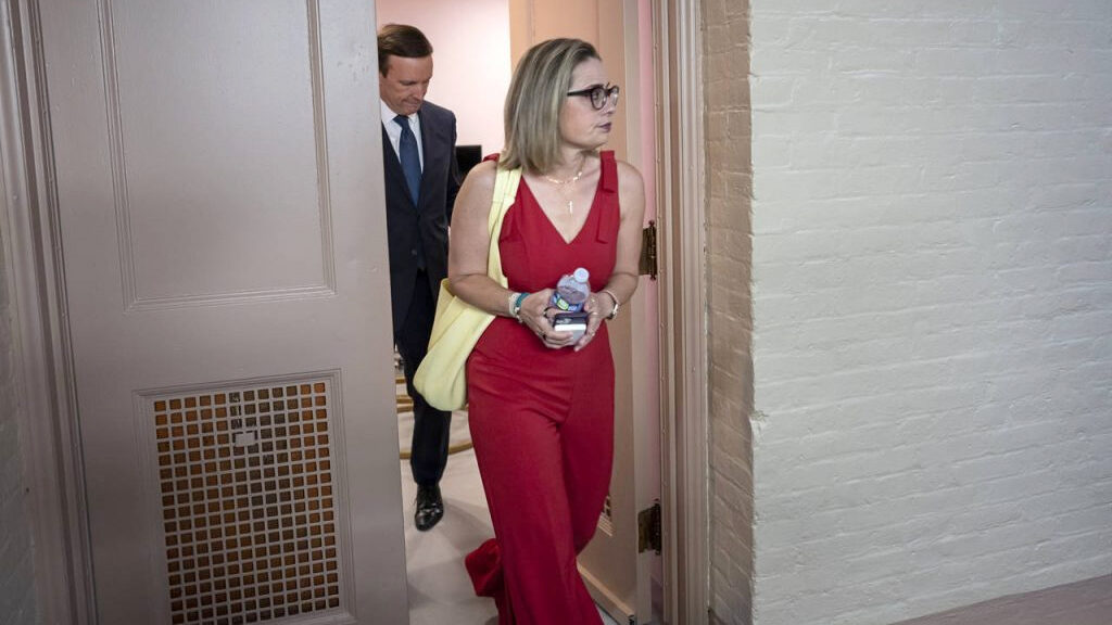 Sinema walking out of door....