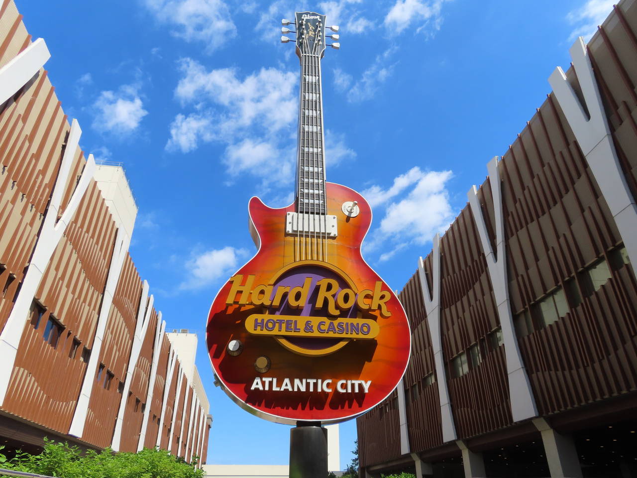 Clouds pass behind the guitar sculpture at the entrance to the Hard Rock casino in Atlantic City, N...