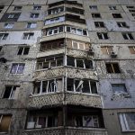 
              An appartment building damaged by a Russian attack in Saltivka district in Kharkiv, Ukraine, Tuesday, July 5, 2022. (AP Photo/Evgeniy Maloletka)
            