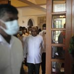 
              Sri Lanka's Parliament Speaker Mahinda Yapa Abeywardana leaves after addressing a press conference in Colombo, Sri Lanka, Friday, July 15, 2022.  Abeywardana says President Gotabaya Rajapaksa has resigned and Parliament will convene to choose a new leader after massive protests took over government buildings to force him out of office. (AP Photo/Rafiq Maqbool)
            